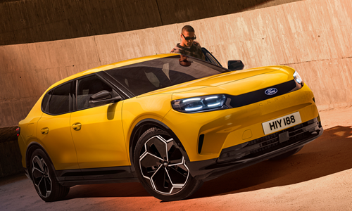 woman driving looking out rear window